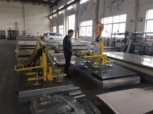 Battery powered vacuum lifter for sheet metal warehouse handling