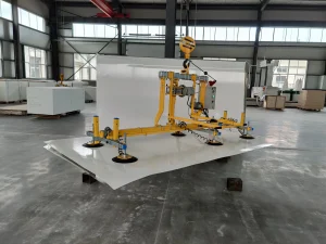 Tilting vacuum lifter for composite panel handling