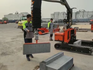 Vacuum tube lifter for building material workstation handling