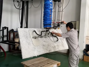Vacuum tube lifter for cement board warehouse transfer