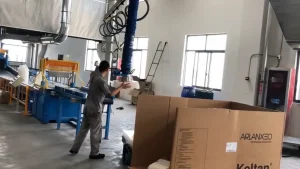 WOLIFT column-mounted jib crane covering fertilizer bag feeding and palletising positions